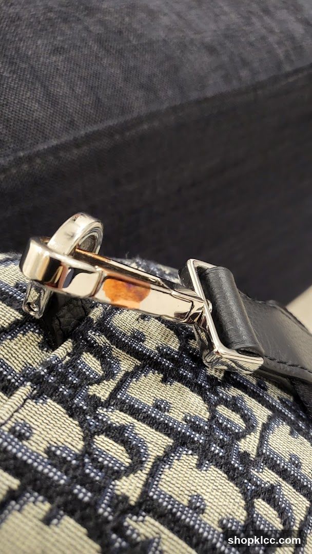 Close-up of a designer bag buckle
