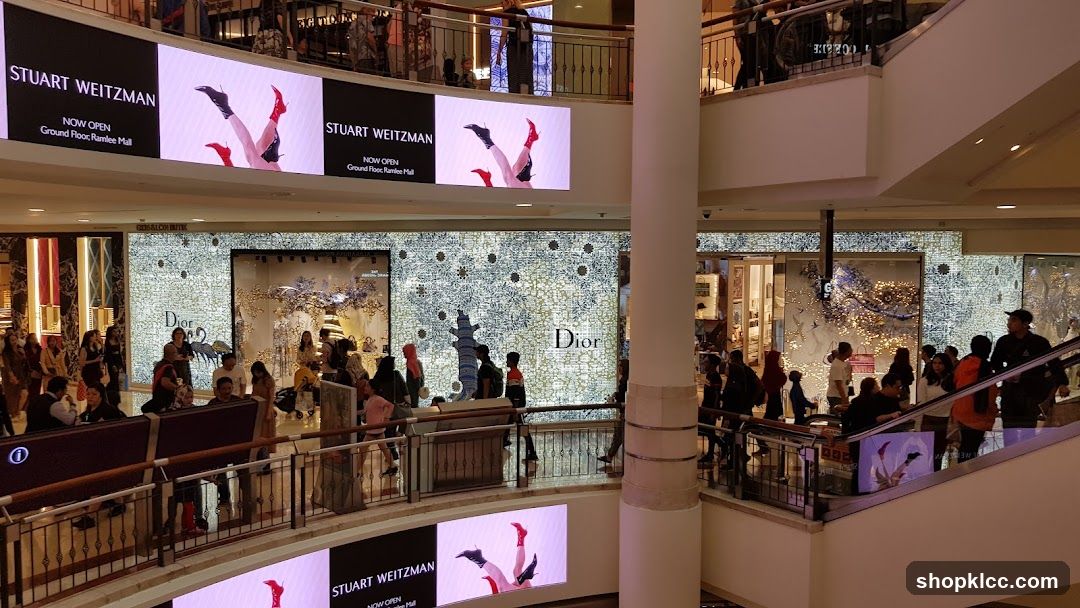 Mall Interior with Storefronts and Digital Displays