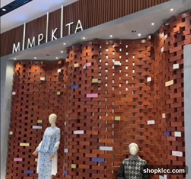 Store Interior with Mannequins and Decorative Wall