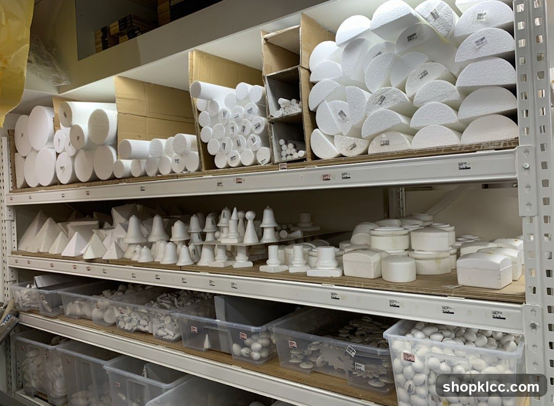 Storage shelves with white craft supplies