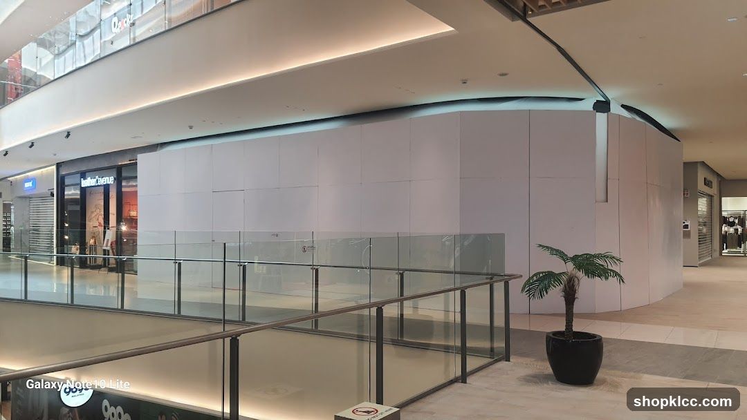 Mall Interior with Storefront and Construction Barrier