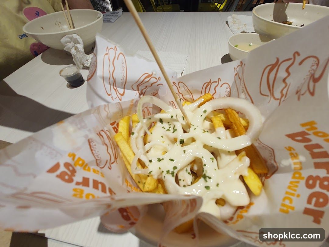Fries with Onion Rings and Sauce
