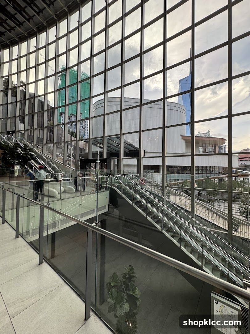 Modern Interior with Escalators and City View