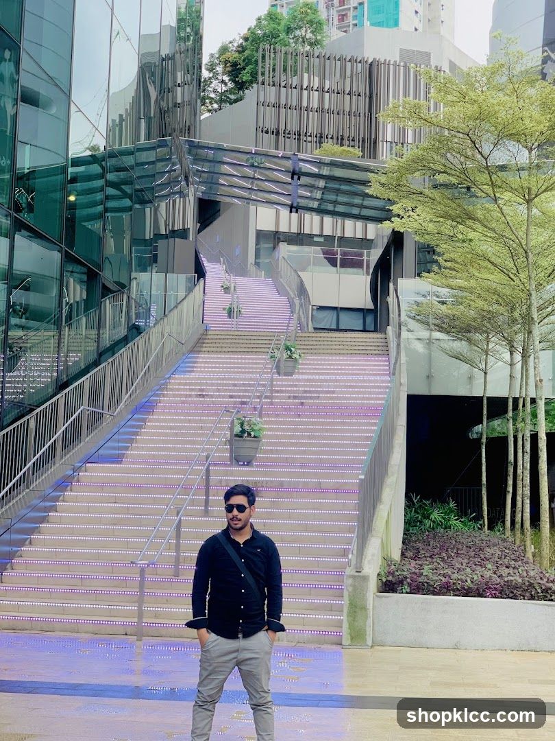 Man Posing on Illuminated Stairs