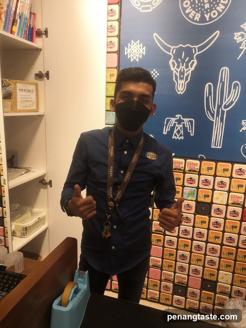 Employee giving thumbs up