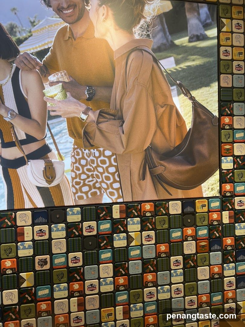 People with bags and patterned tiles