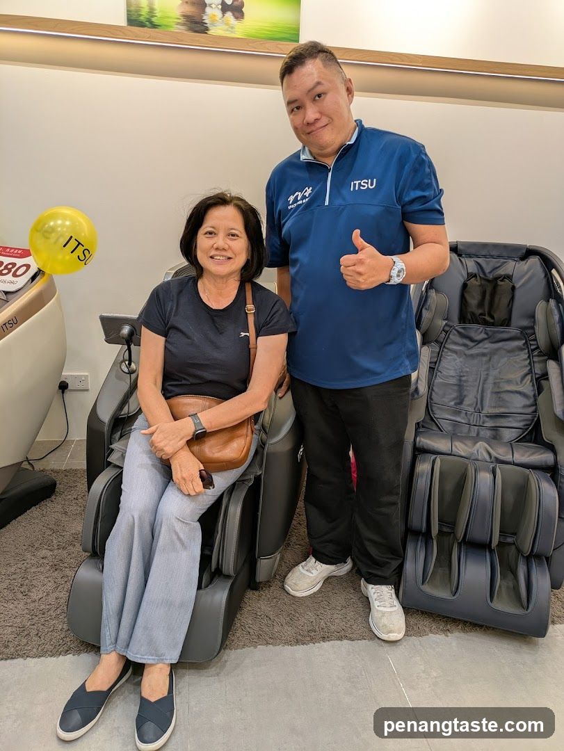 People posing with massage chairs