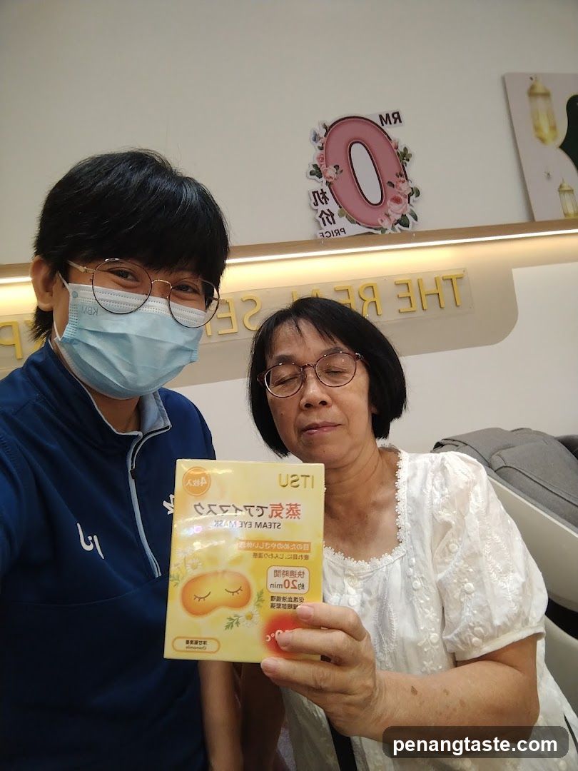 Two Women Holding a Product