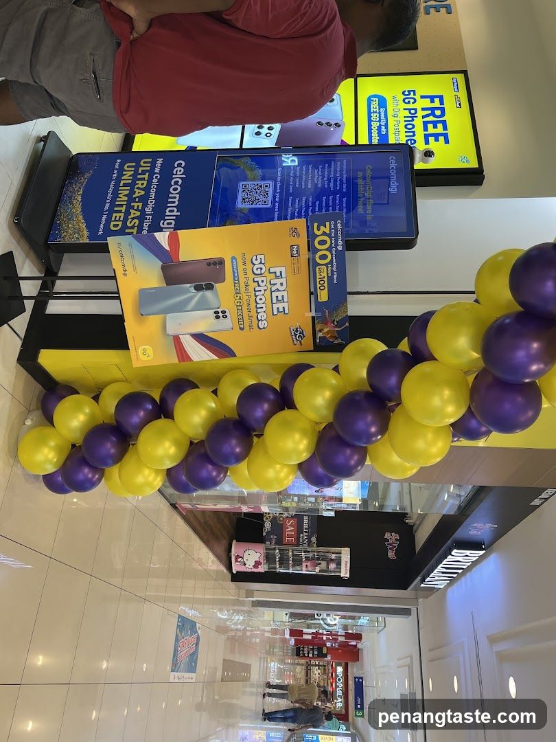 Promotional display for CelcomDigi 5G phones and fiber internet