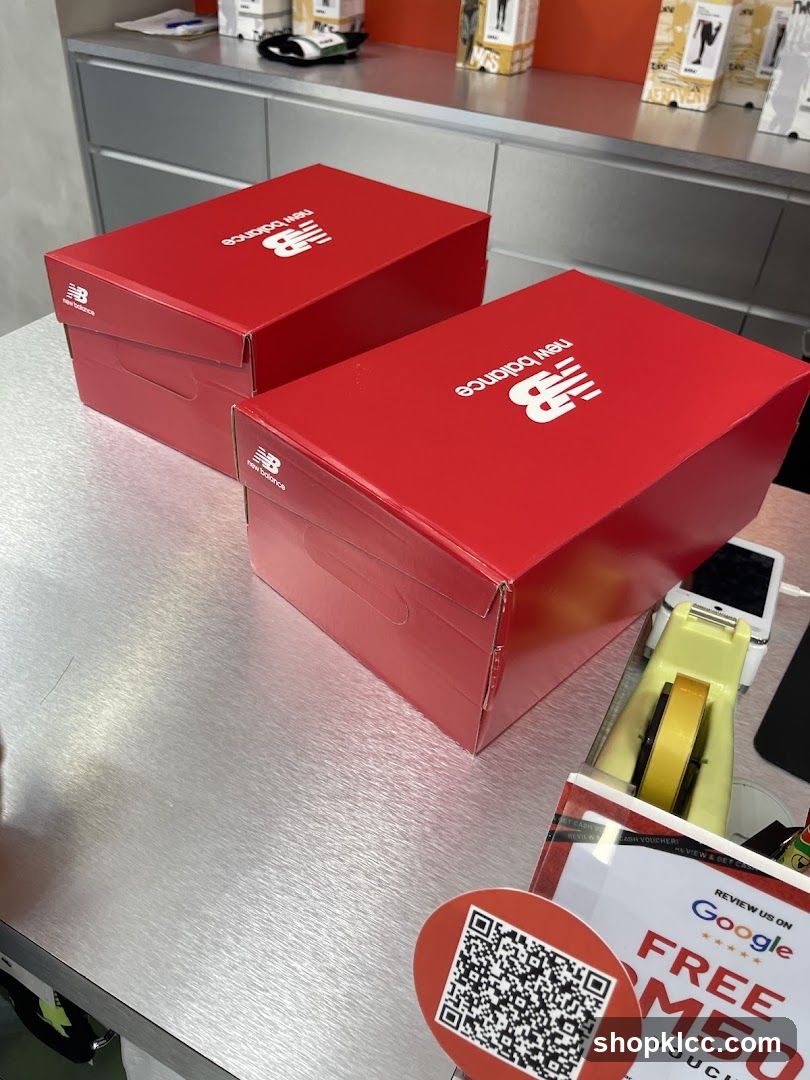 New Balance Shoe Boxes on Counter