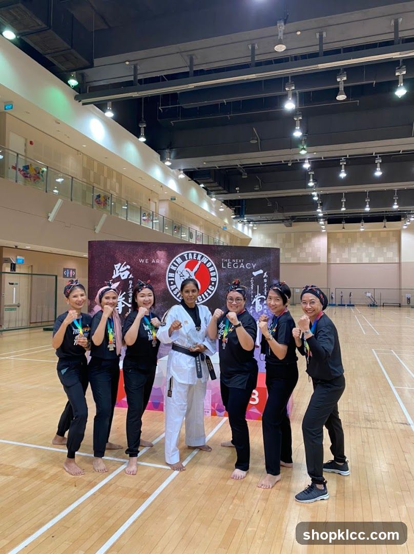 Taekwondo Team Posing with Medals
