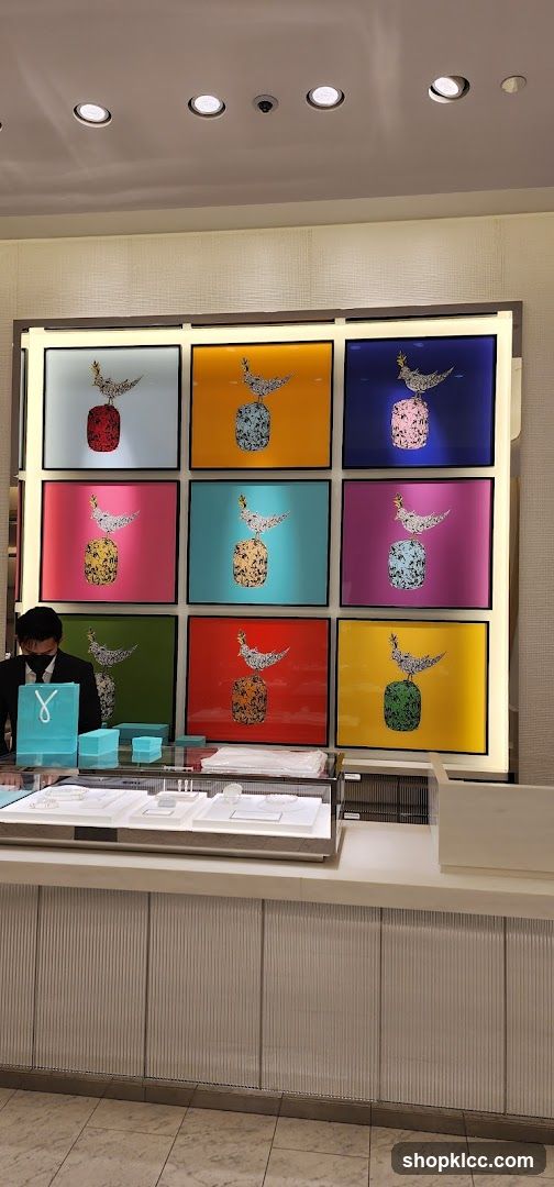 Jewelry store display with artwork