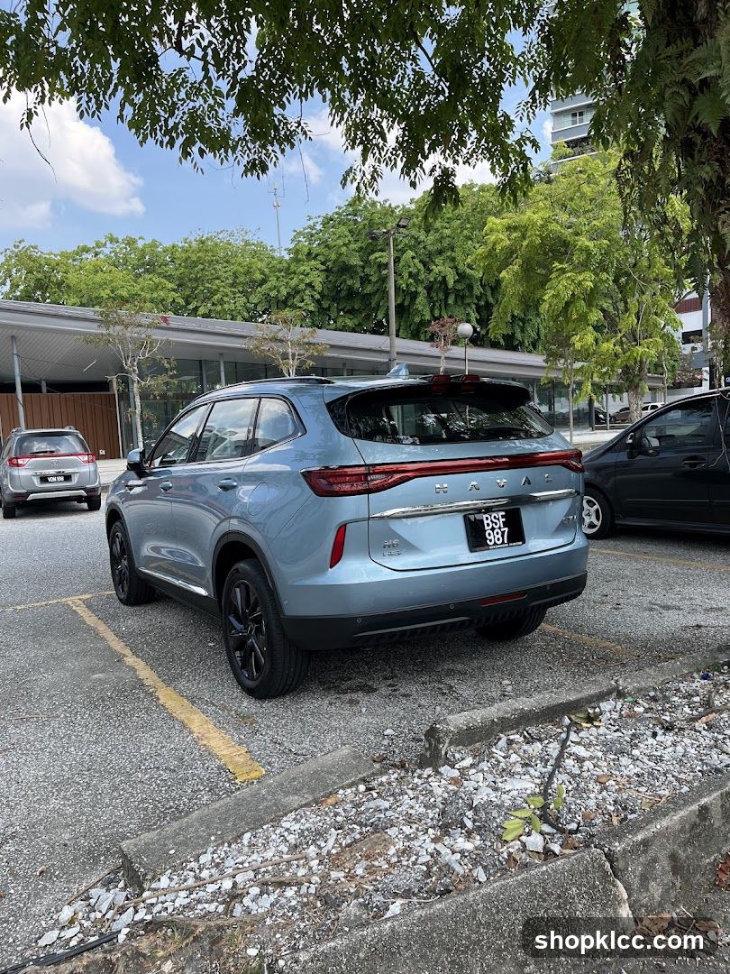 Blue SUV parked in a lot