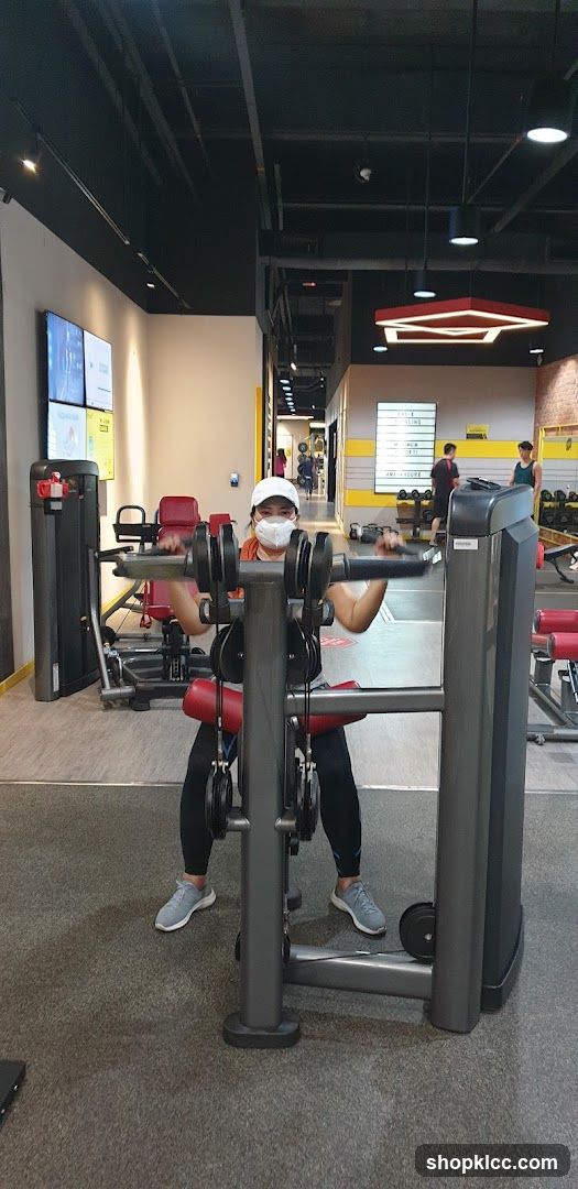 Woman using gym equipment