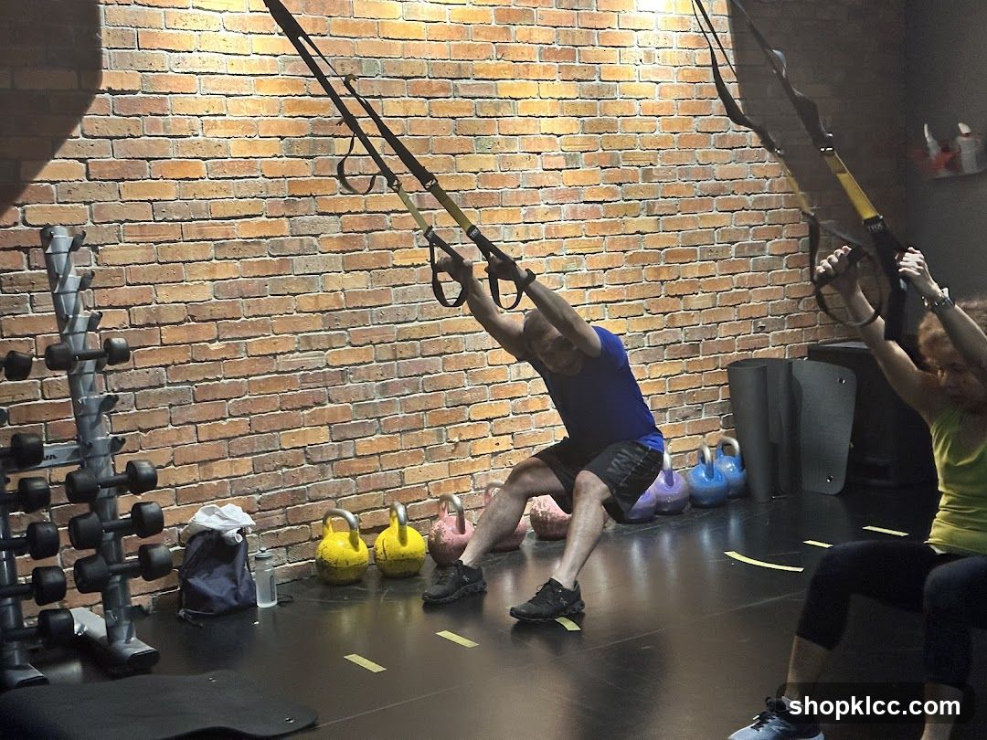 Gym workout with TRX straps