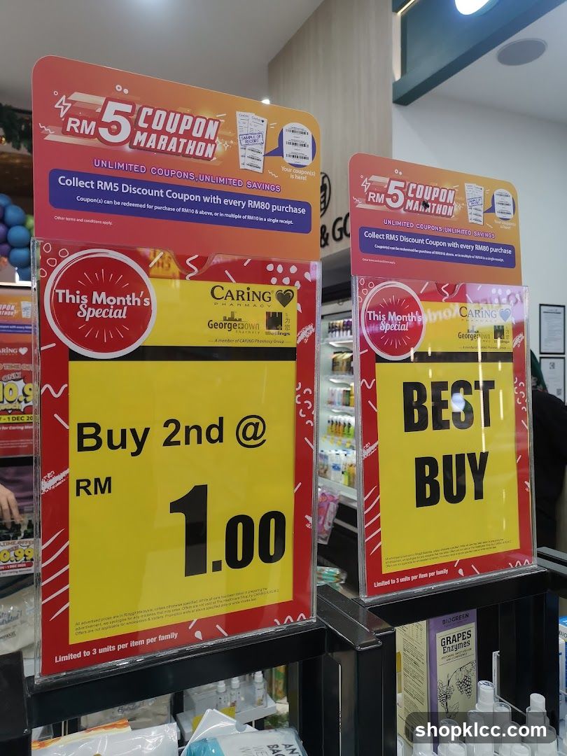 Promotional signs for CARING Pharmacy