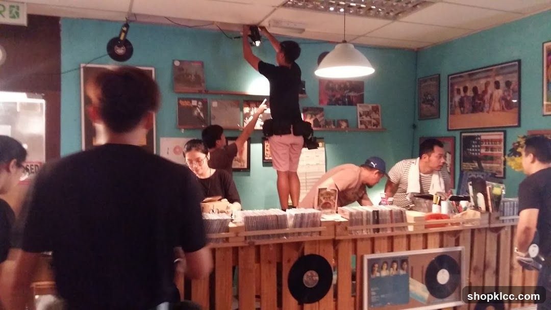 People working in a record store