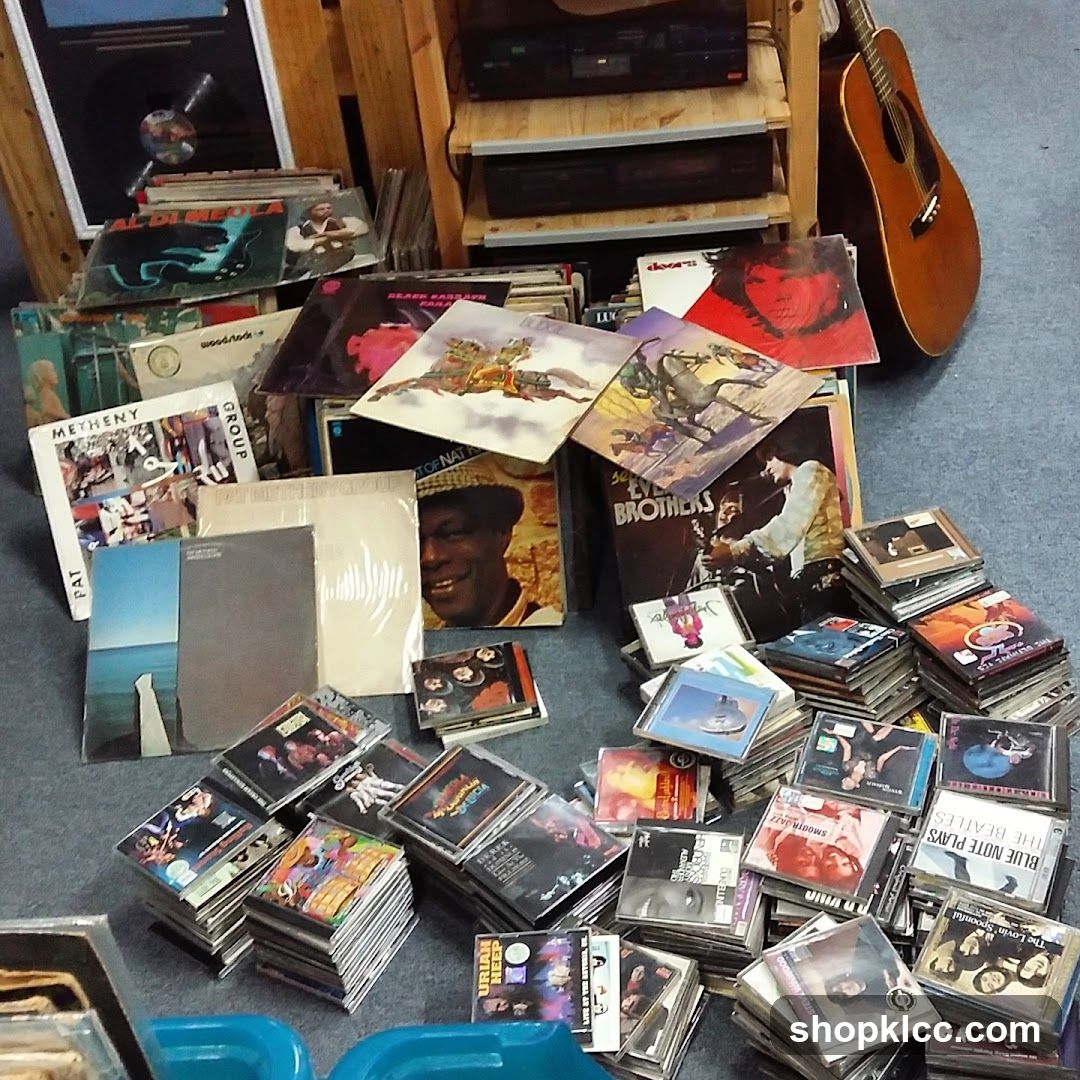 Collection of Vinyl Records and CDs