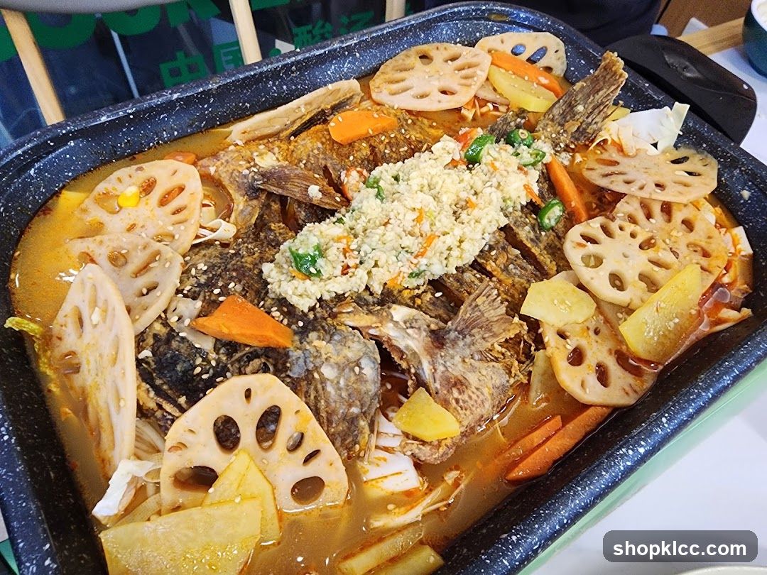 Spicy Braised Fish with Lotus Root and Carrots