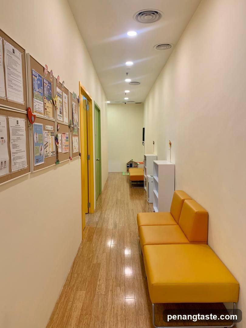 Hallway with seating and bulletin boards