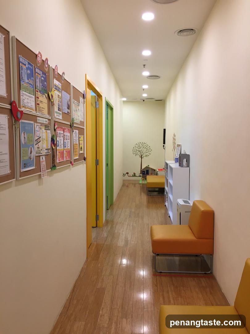 Hallway with bulletin boards and seating