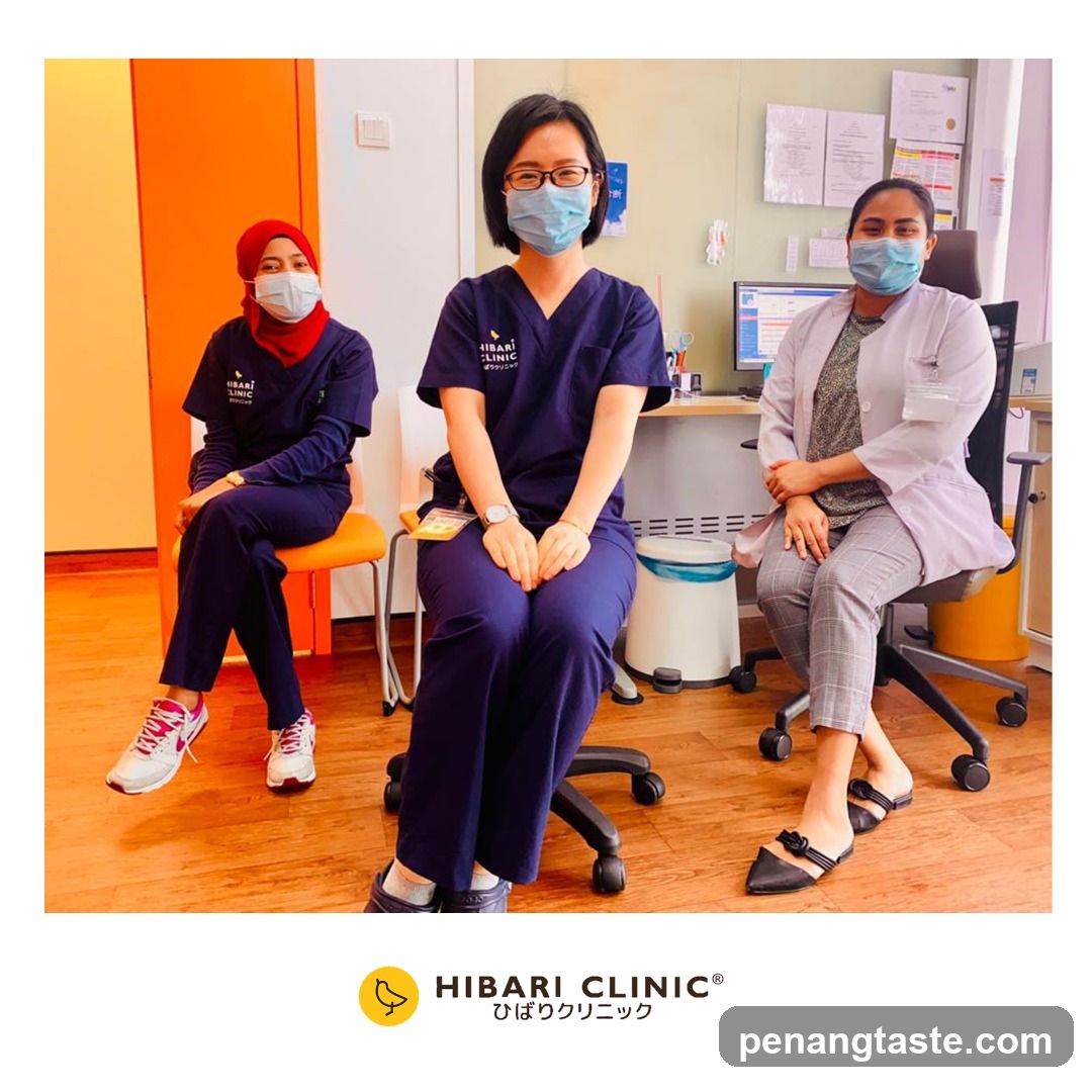 Three medical professionals in a clinic