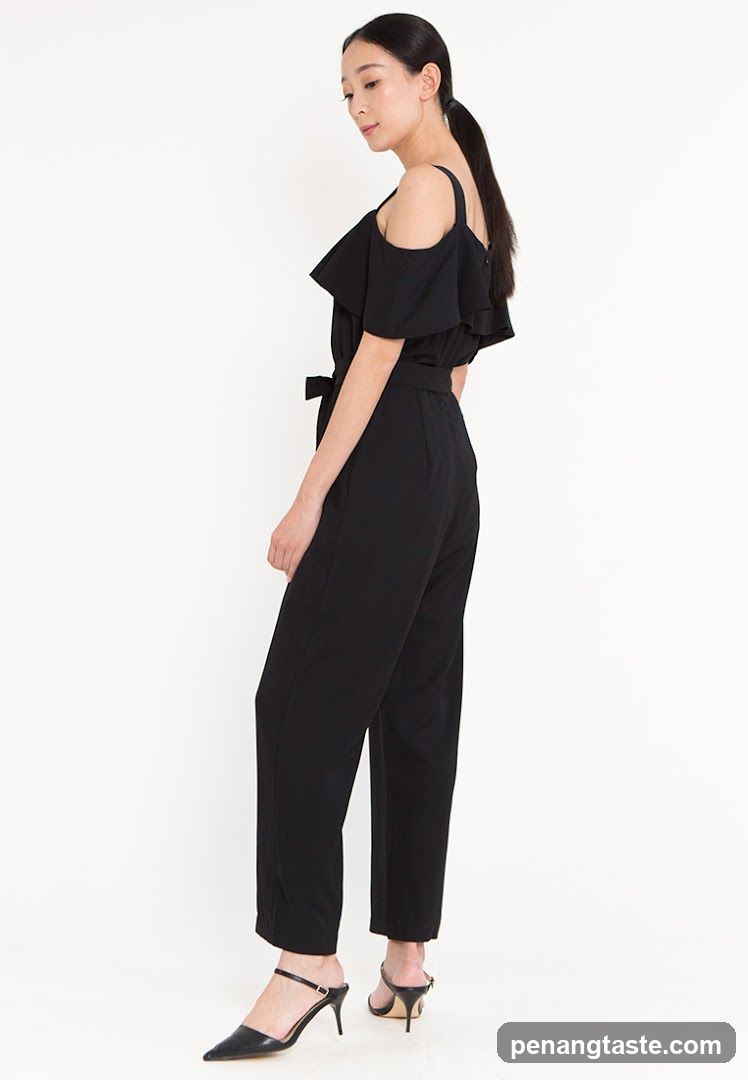 Woman in Black Jumpsuit