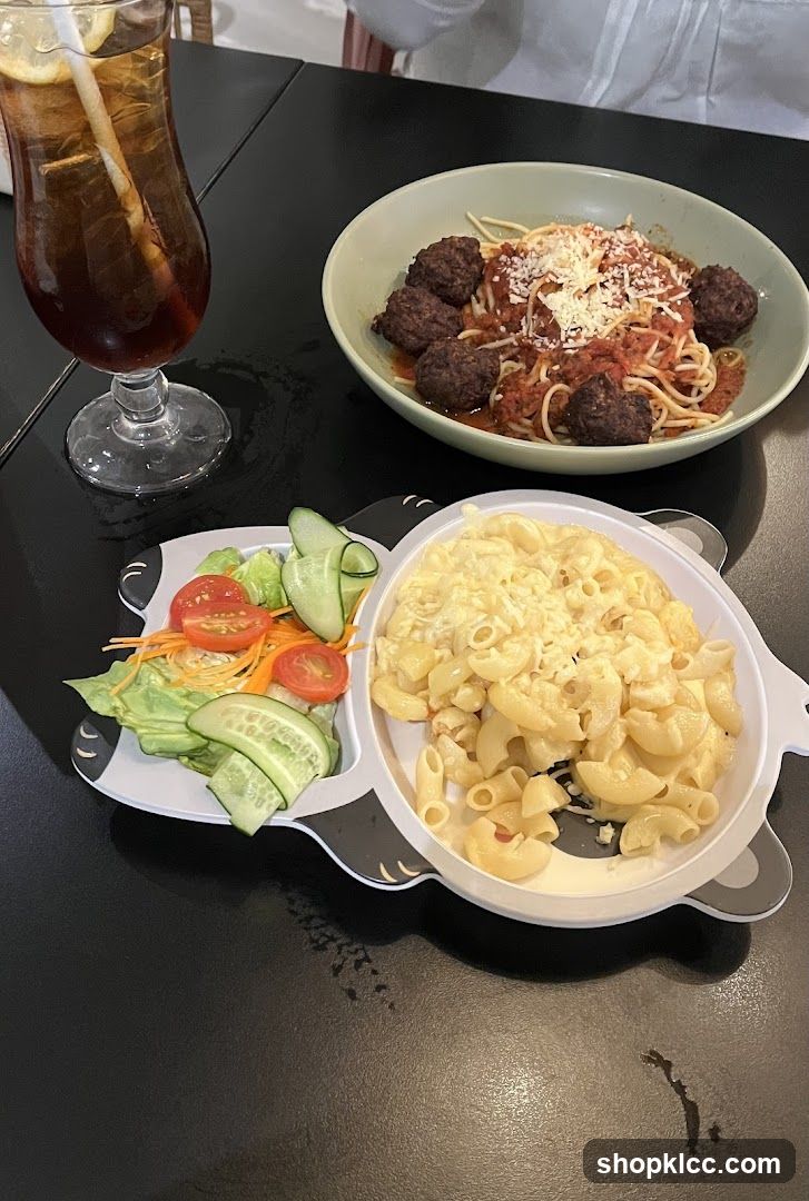 Meal with Spaghetti and Meatballs, Macaroni and Cheese, and Salad
