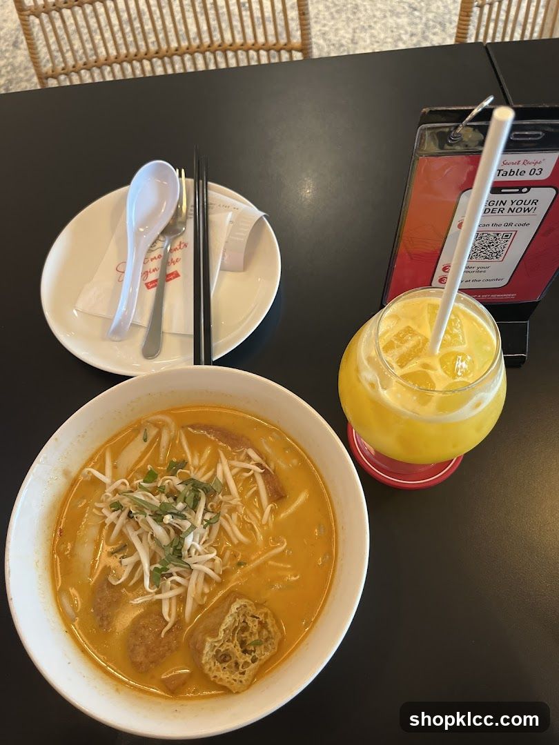 Laksa and Orange Juice