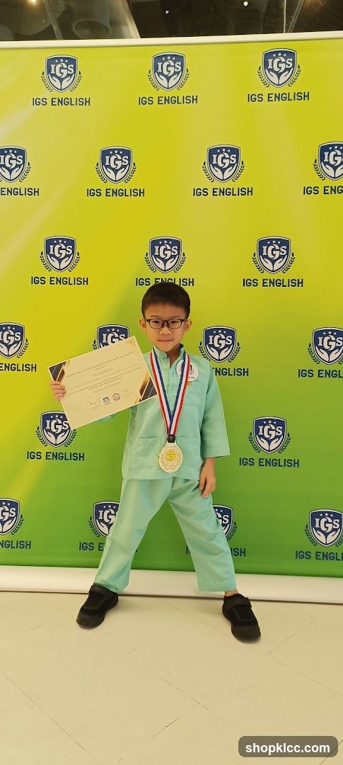 Boy with Certificate and Medal
