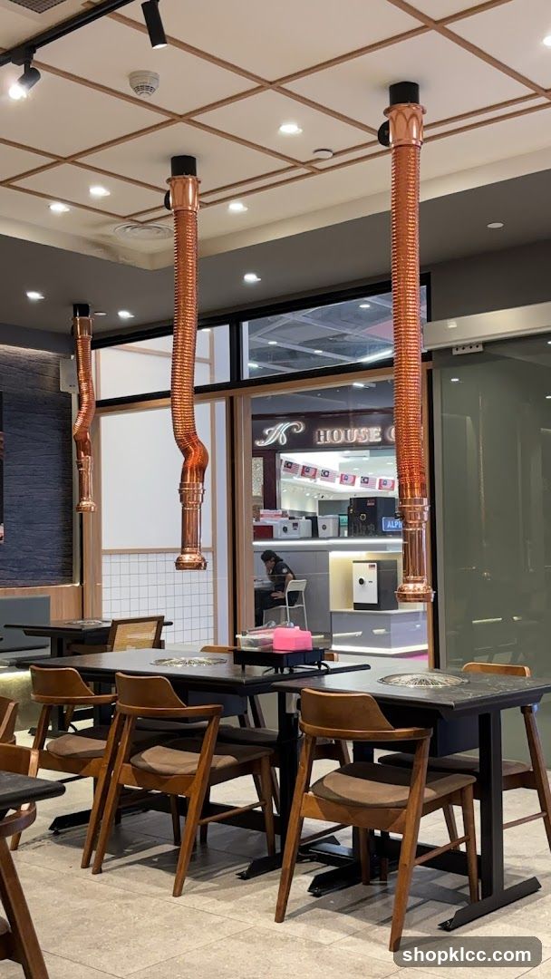 Restaurant Interior with Copper Ventilation Hoods