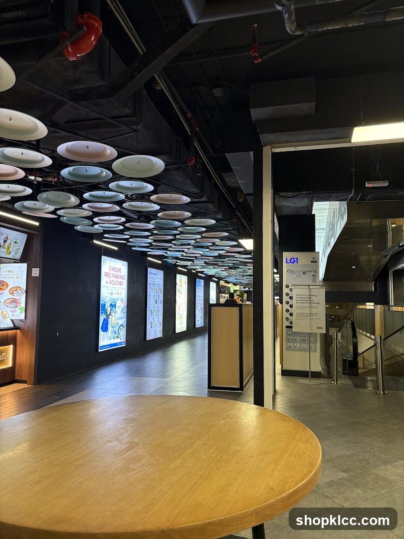 Indoor walkway with decorative ceiling and signage