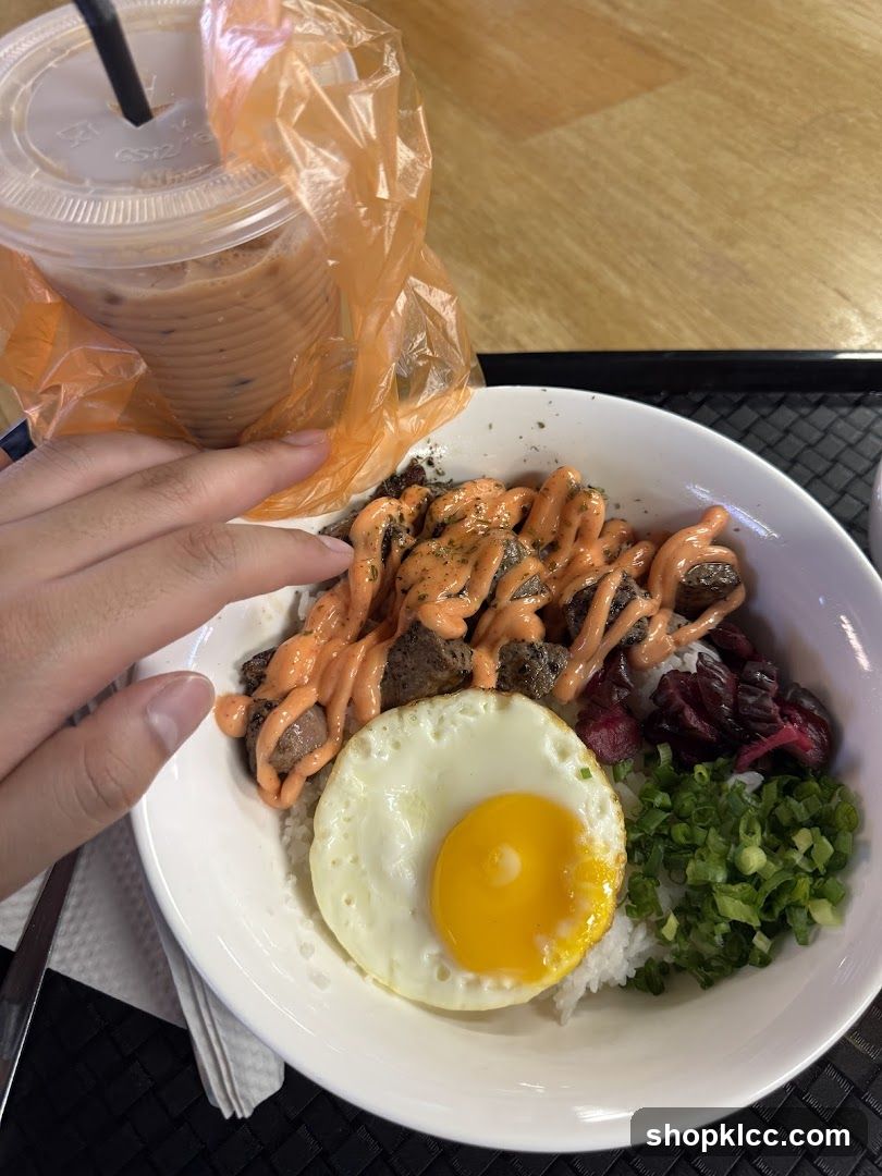 Beef Rice Bowl with Fried Egg and Drink