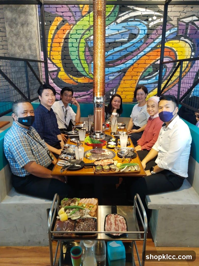Group enjoying a meal at a Korean BBQ restaurant