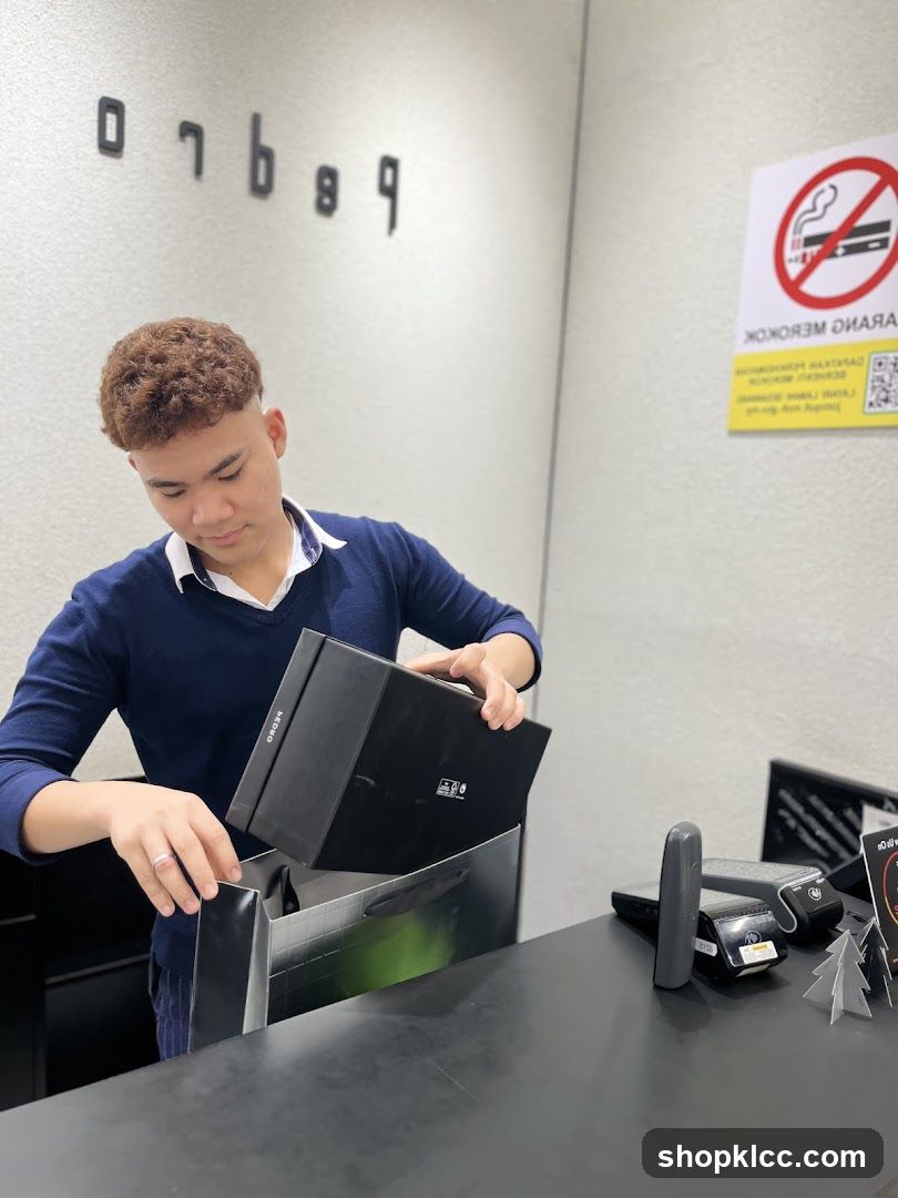 Staff Unboxing Product at Counter