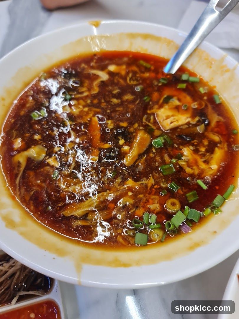 Spicy Soup with Egg and Green Onions