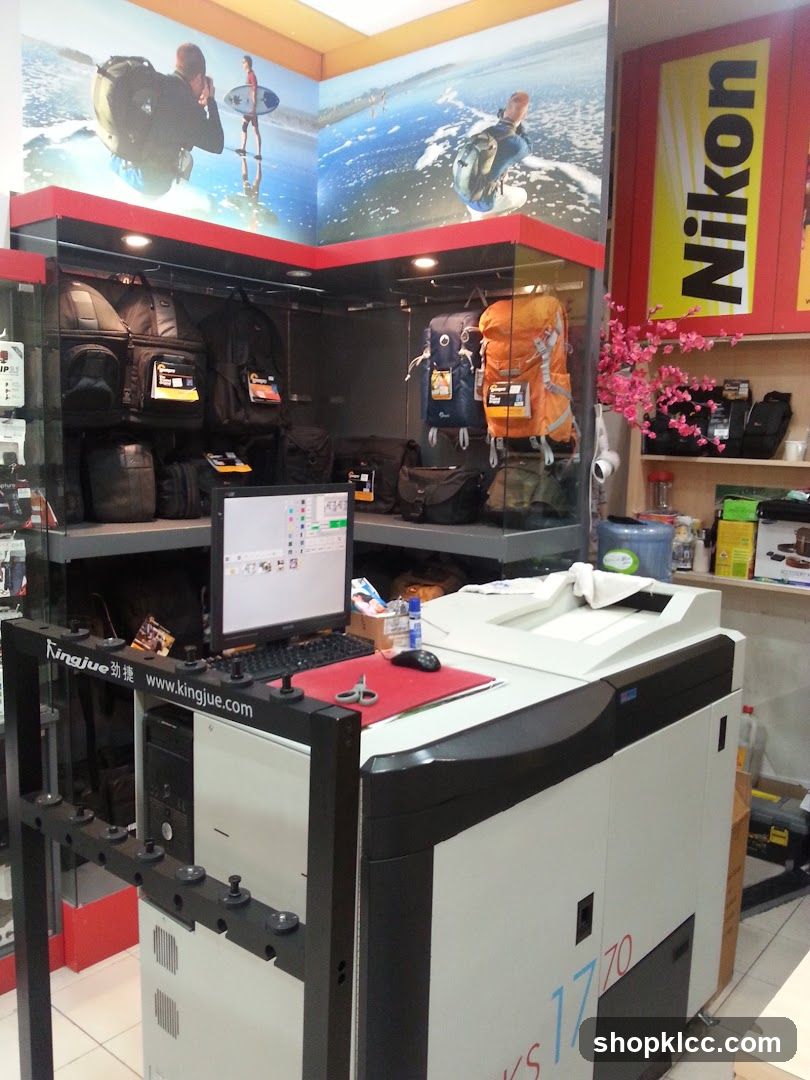 Camera Shop Interior with Printing Equipment