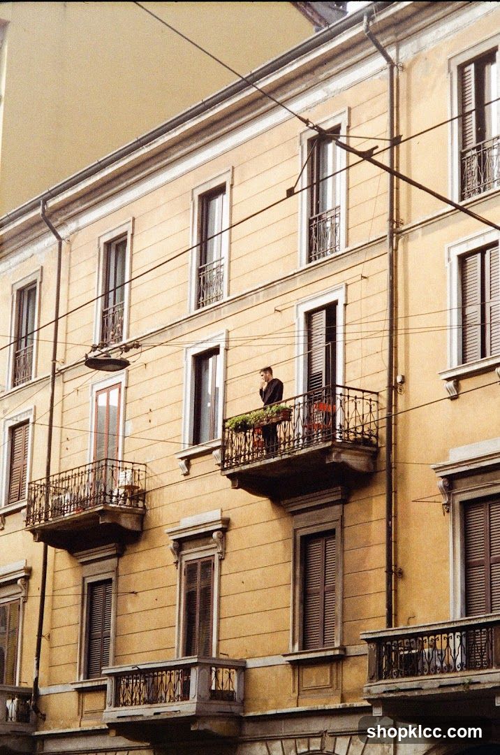 Man on Balcony