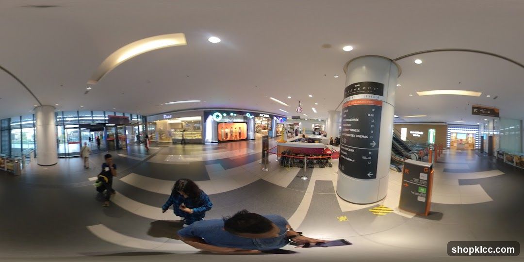 Mall Interior with Shops and Escalators