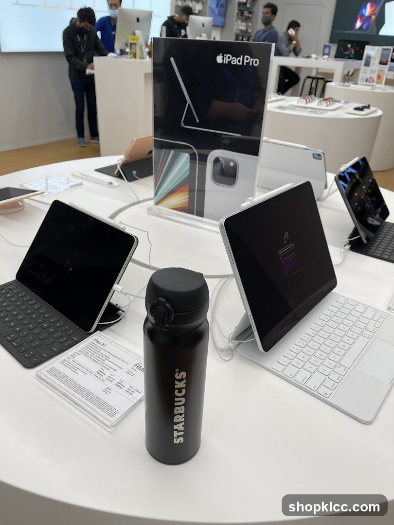 Apple Store Display with Starbucks Tumbler