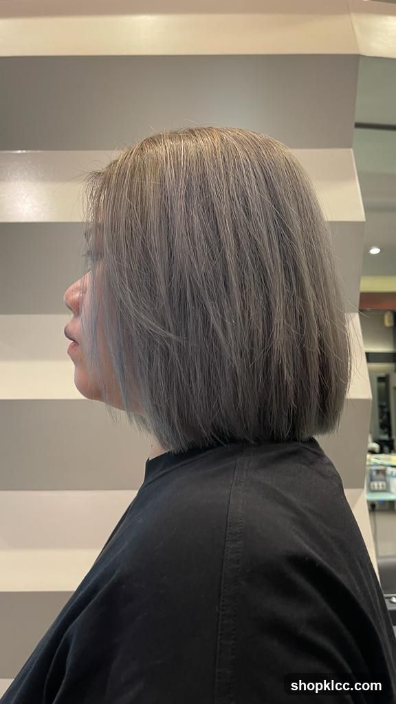 Woman with gray bob haircut
