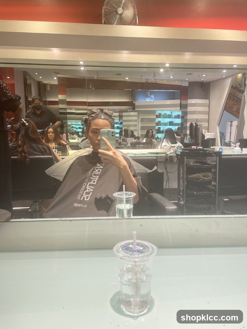 Woman getting hair treatment