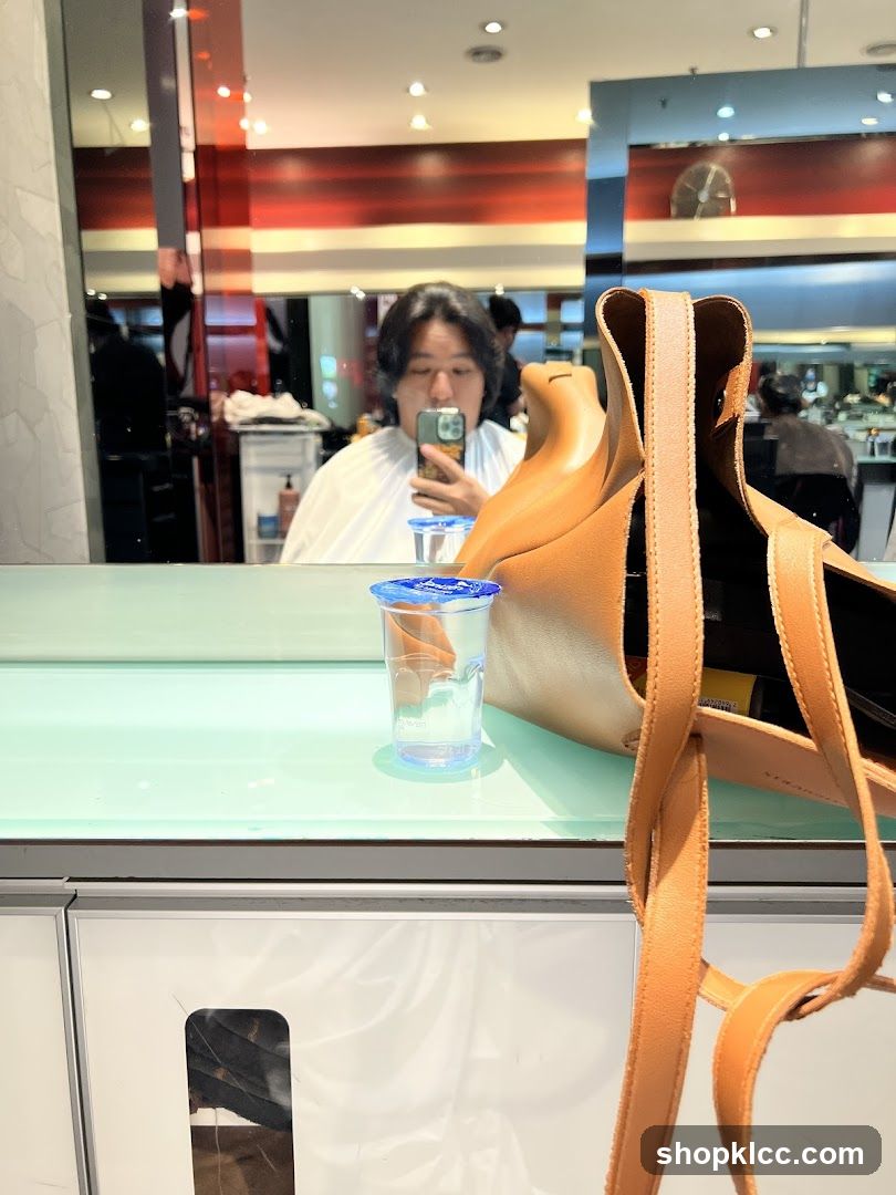 Person taking a selfie in a salon