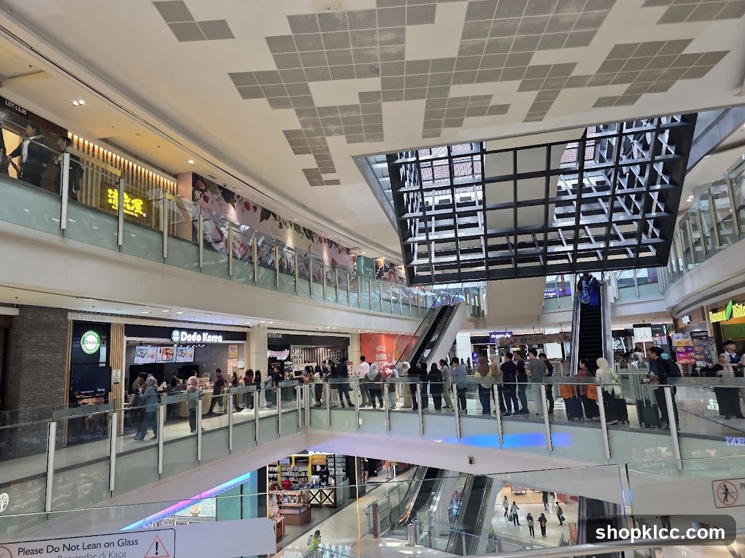 Mall Interior with Shops and Escalators