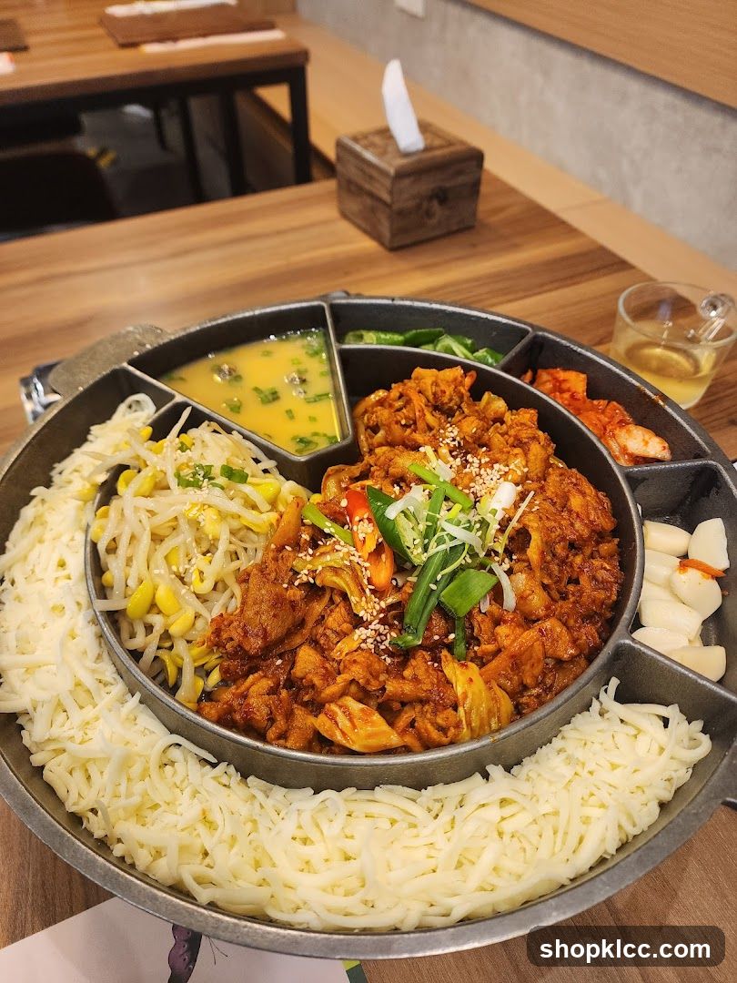 Korean BBQ Meal with Cheese and Side Dishes