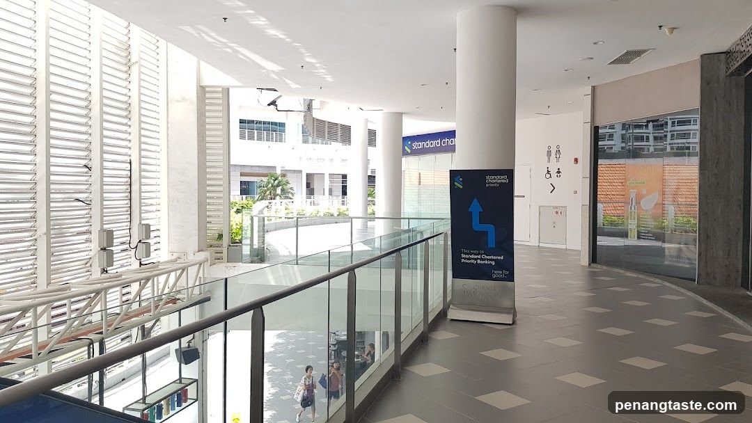 Mall Interior with Standard Chartered Signage