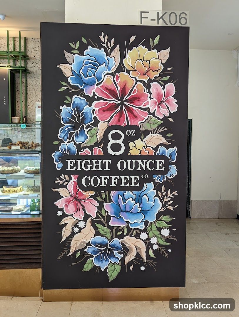 Chalkboard with floral design and coffee shop name
