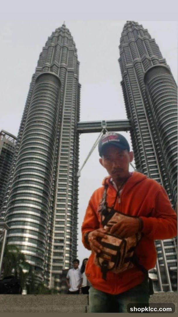 Man in front of Petronas Towers