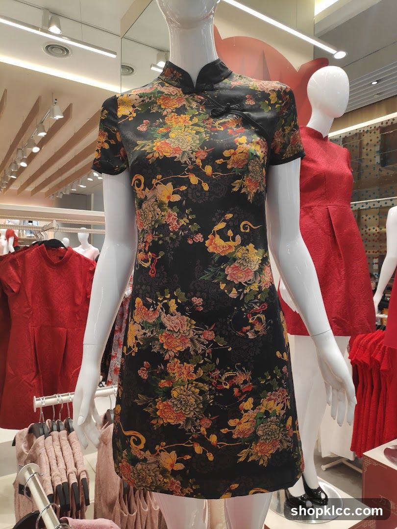 Mannequins in a store wearing traditional Chinese dresses