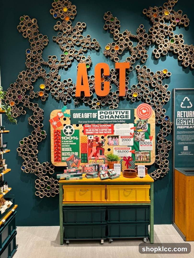 Display with "ACT" and "Give a Gift of Positive Change" message